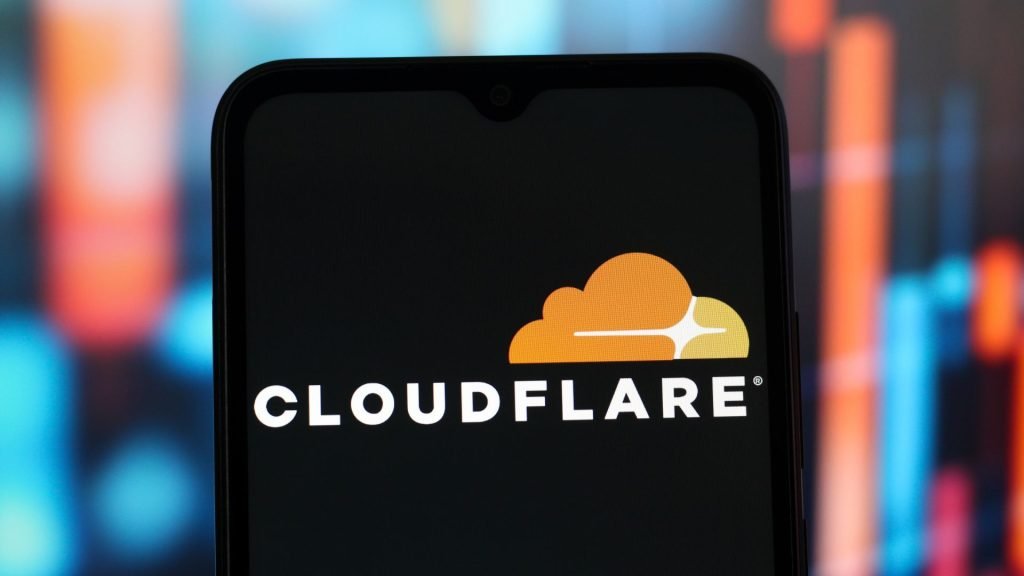 A Cloudflare outage is taking down parts of the internet In this photo illustration, the Cloudflare logo is seen displayed on a smartphone screen.