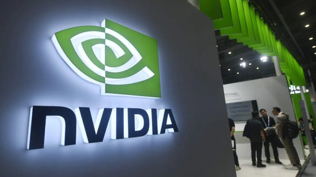Nvidia’s Jensen Huang Says Agentic AI Has Arrived at an ‘Inflection Point’ A sign promotes Nvidia at a conference in China