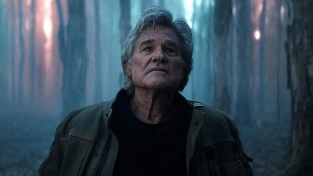 A production still from Monarch: Legacy of Monsters featuring Kurt Russell in a forest.