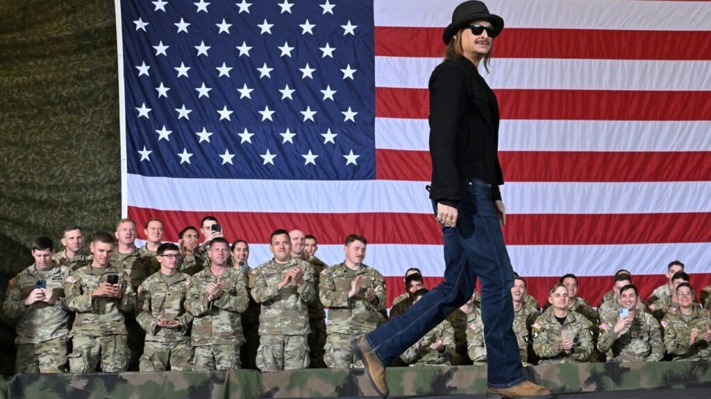 Military reviewing after helicopters hovered alongside Child Rock’s swimming pool as he saluted : NPR Army reviewing after helicopters hovered alongside Kid Rock's swimming pool as he saluted : NPR