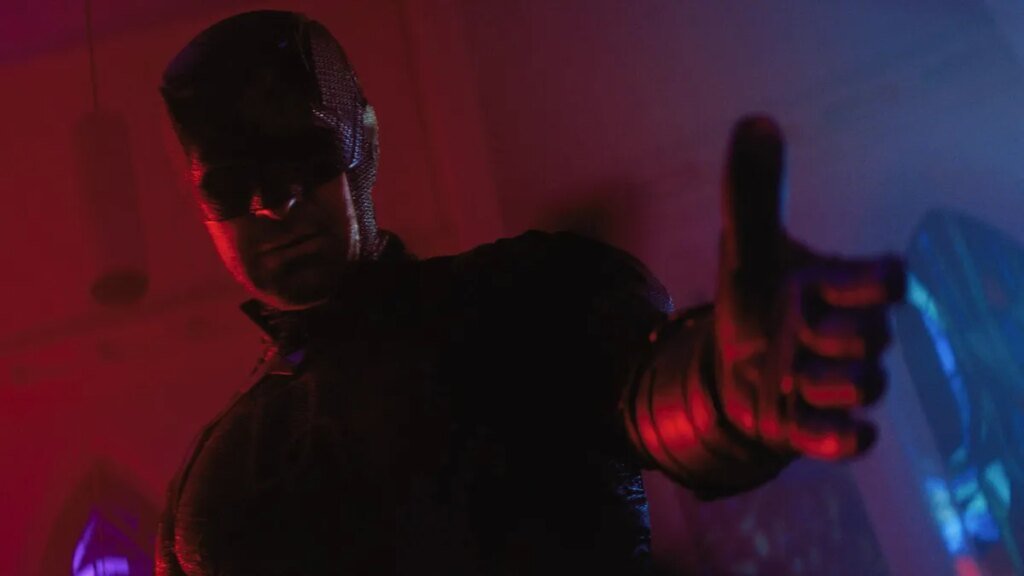 ‘Daredevil: Born Once more’ Season 2: When to Stream Episodes 2 and three suited up daredevil with outstretched hand with dark red and blue lighting in background