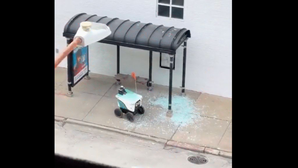 Delivery Robot Drives Through Bus Stop Shelter, Shattering Glass Everywhere