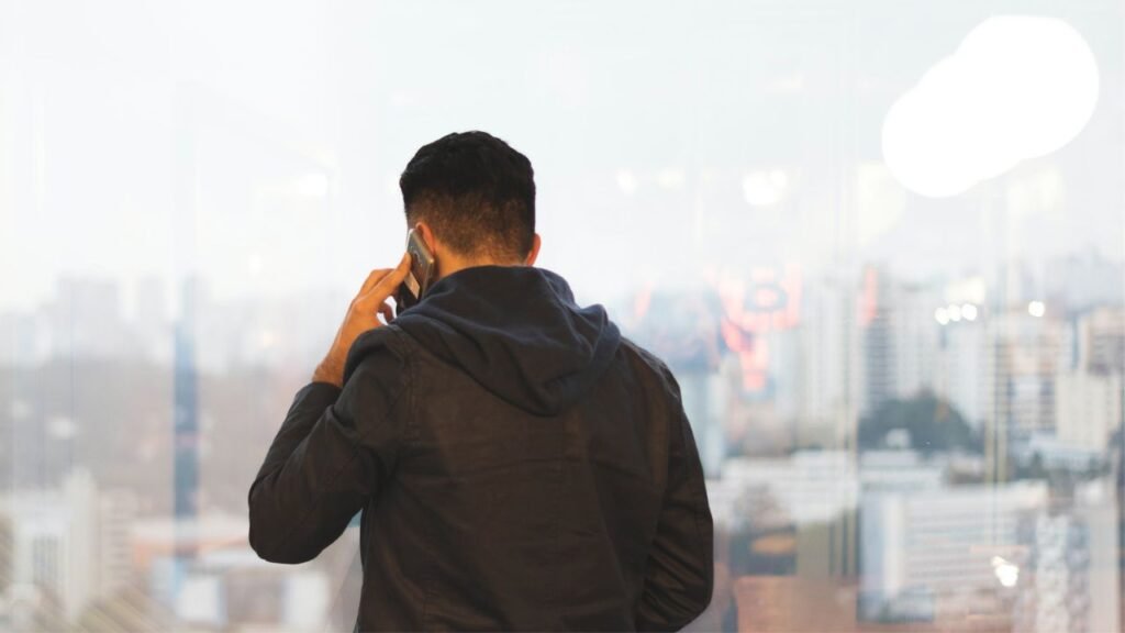 I requested ChatGPT how you can inform if a cellphone name is an AI rip-off — right here’s what to search for Talking on Phone