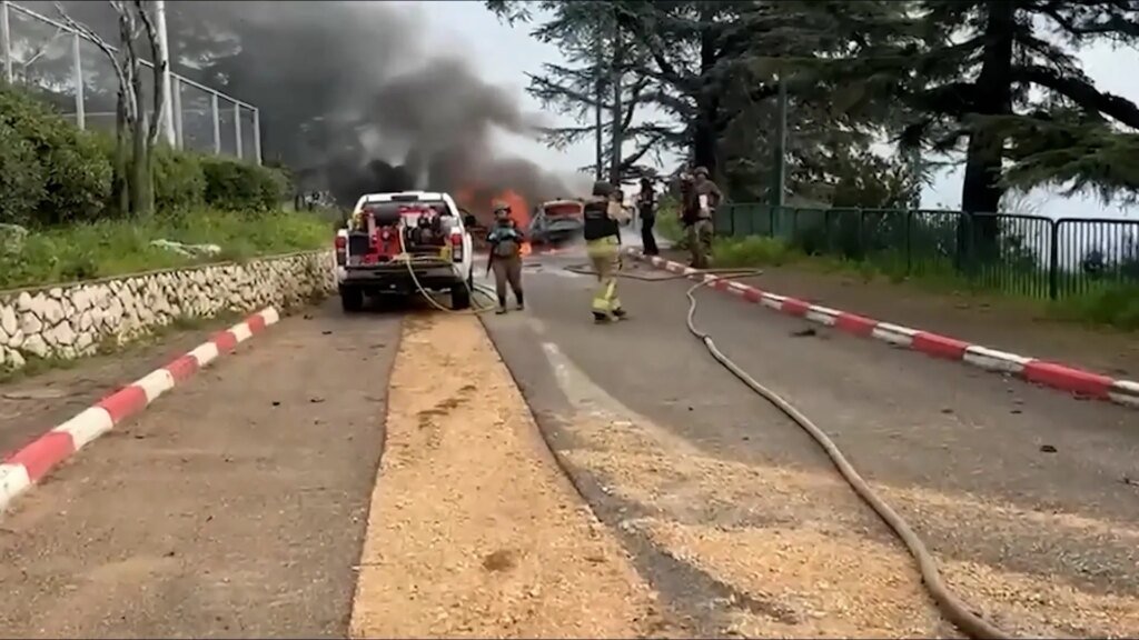 Israeli firefighters battle automobiles blaze after missile assault from Lebano | Israel assaults Lebanon Israeli firefighters battle vehicles blaze after missile attack from Lebano | Israel attacks Lebanon