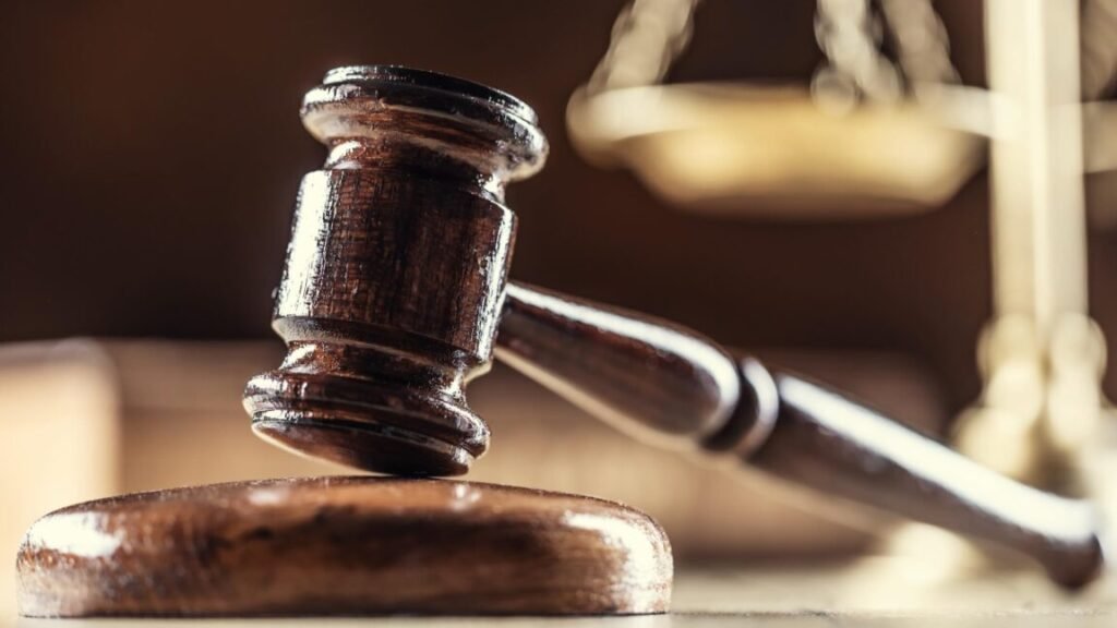 Decide halts Nexstar/Tegna merger after FCC let corporations exceed TV possession restrict A judge's gavel with scales in the background.