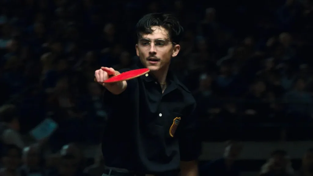 ‘Marty Supreme’ Has an HBO Max Streaming Launch Date Timothée Chalamet holds a table tennis racket in a still from Marty Supreme.