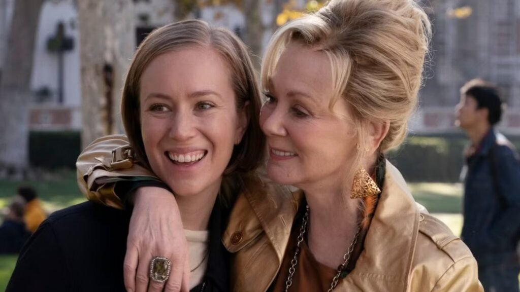 Deborah throws her arm around Ava's shoulders