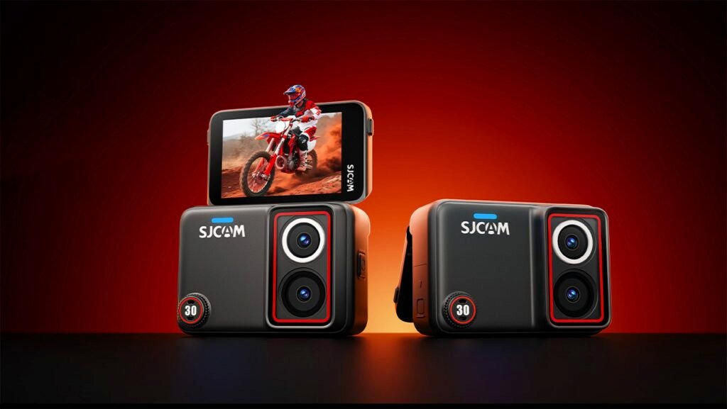 Two of the SJCAM SJ30 action cam on a bright yellow and orange background, one with the rear screen flipped up