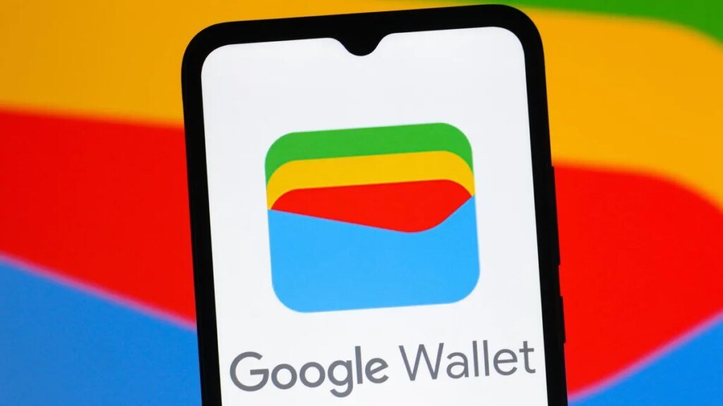 Rainbow Google Wallet logo on a white background on a mobile phone in front of a rainbow background.