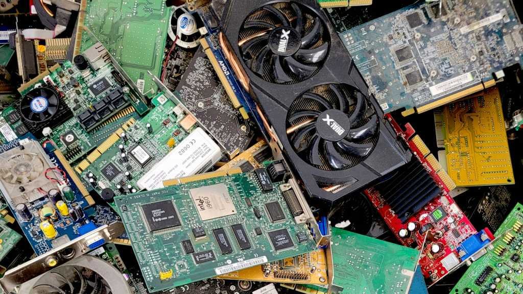 Tips on how to safely purchase used PC components in 2026 Used PC components hardware e-waste in a dump recycle