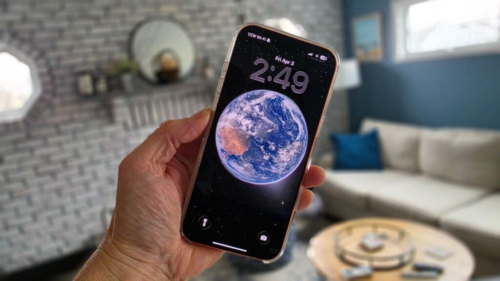 Artemis II mission Earth Photo Wallpaper in hand