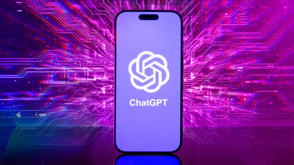 OpenAI Is Including a $100-a-Month ChatGPT Subscription Due to Vibe Coding A ChatGPT logo on a phone, against a neon pink background