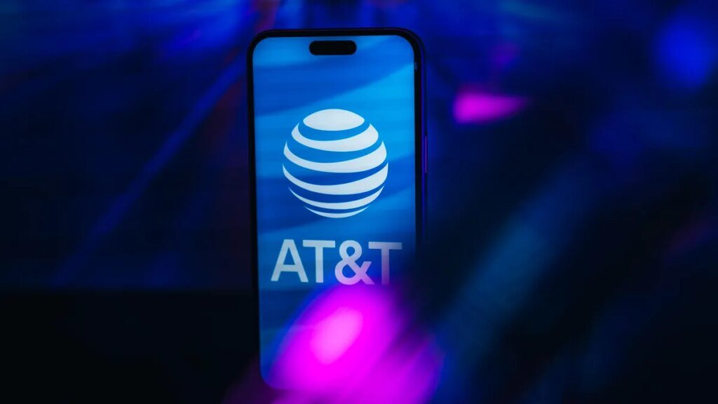 Ought to You Swap to AT&T’s New Limitless Plans to Save Cash? AT&T logo on iPhone screen against a blue backdrop