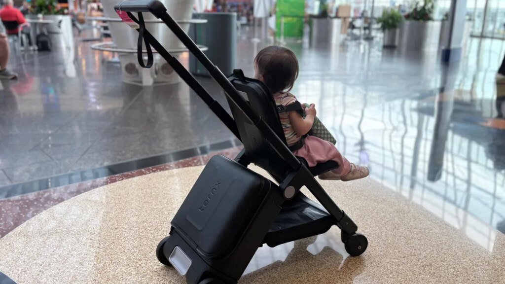 This stroller turns into a carry on-suitcase, and I recommend it for traveling parents