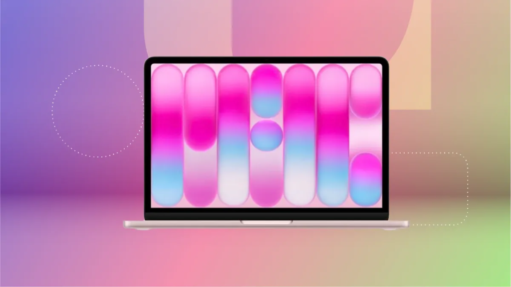 Pink MacBook Neo against purple, pink and green CNET background