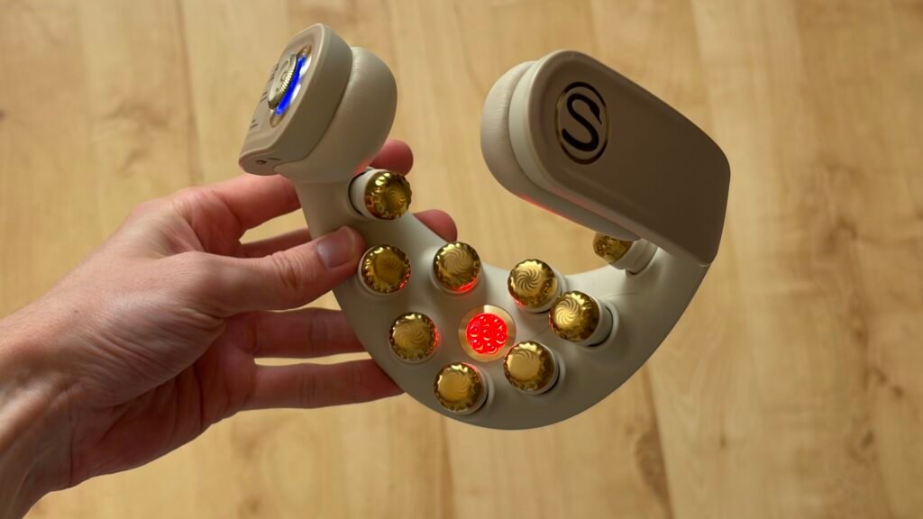 This foldable, futuristic neck massager will heat your aching muscles and talk to you while it does so — yes, really