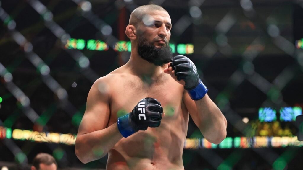 Khamzat Chimaev in the Octagon during a UFC bout.